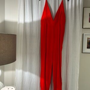 Line & Dot Red V-Neck Jumpsuit with Sleeveless Design
